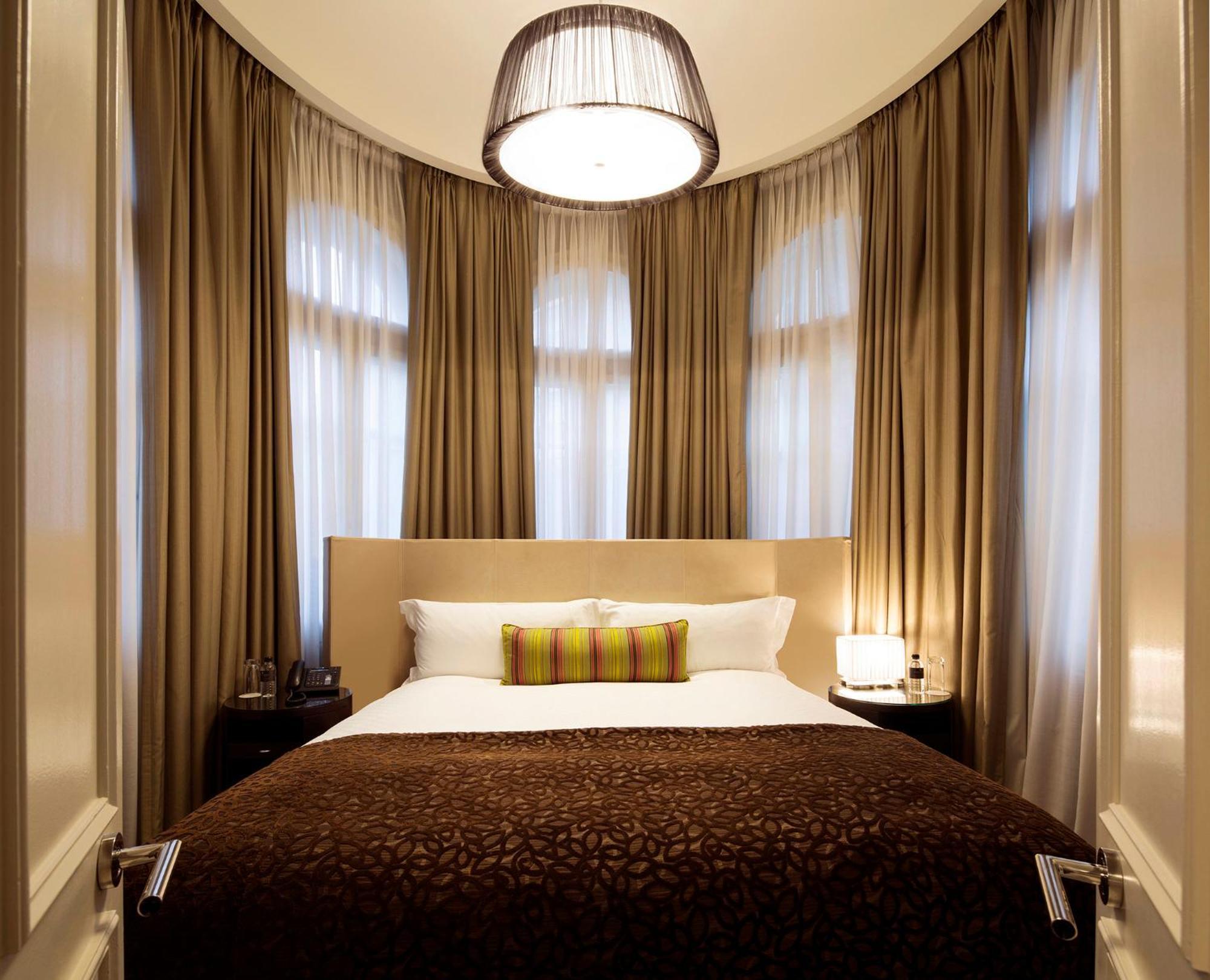 Intercontinental Melbourne The Rialto By Ihg Hotel Ngoại thất bức ảnh A bedroom at the hotel